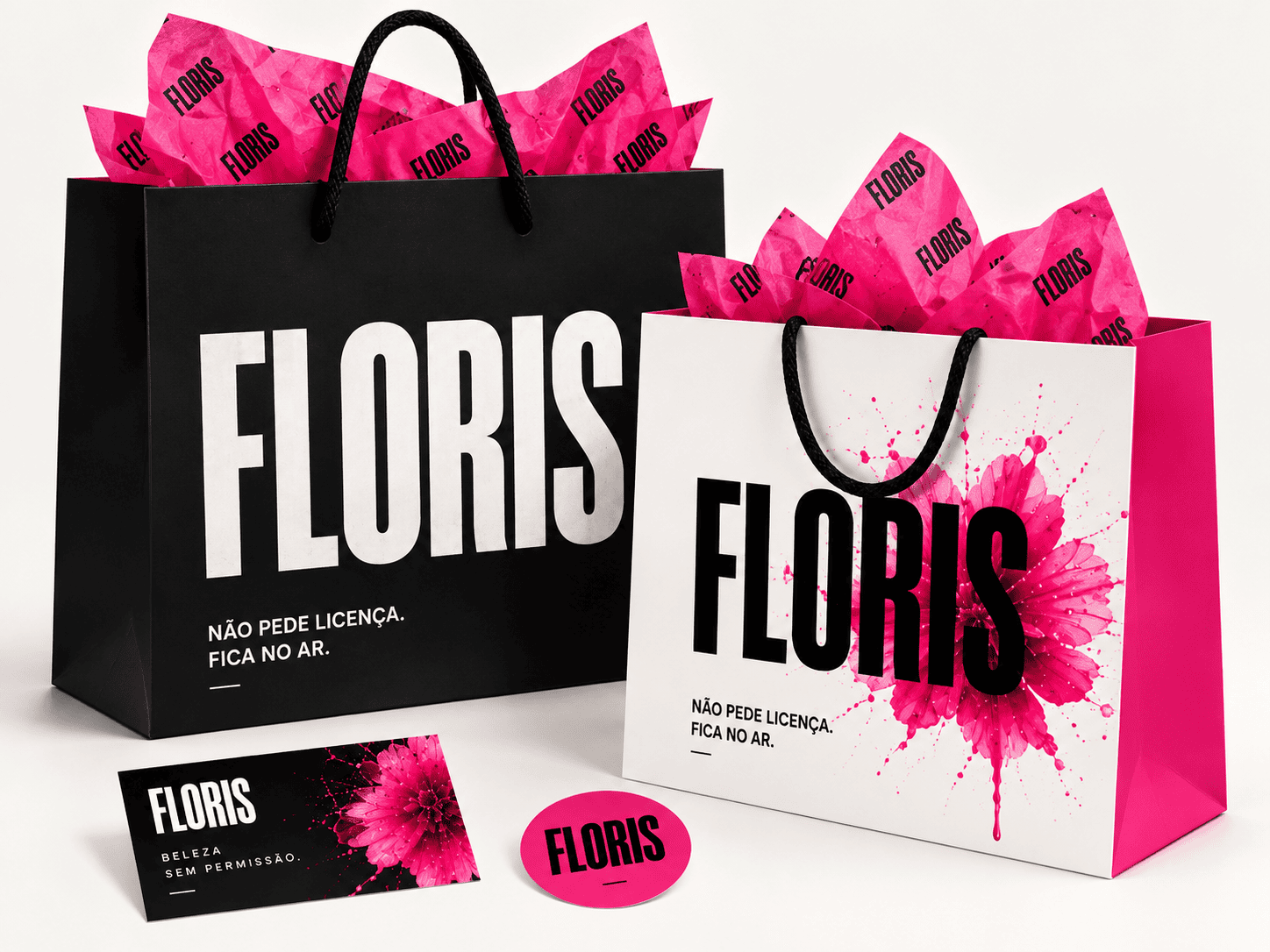 Sacos de compras e cartão da Floris em preto e cor-de-rosa